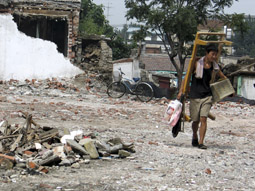 The demolition of Dazhalan, a neighbourhood just south of Tiananmen Square and one of the oldest parts of Beijing, in Ou Ning's documentary Meishi Street (2006)