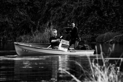 Mike Parr, Gotaro Uematsu, Pure Water Into Polluted Water 2010, Georges River, performance still