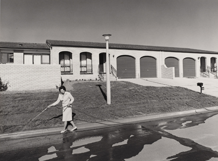 Gerrit Fokkema, Woman hosing, Canberra, 1979, in Australian Vernacular Photography,  courtesy Art Gallery of NSW