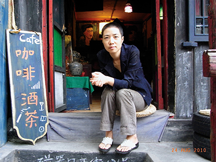 Zhang Lei at home, film still from China’s 3 Dreams